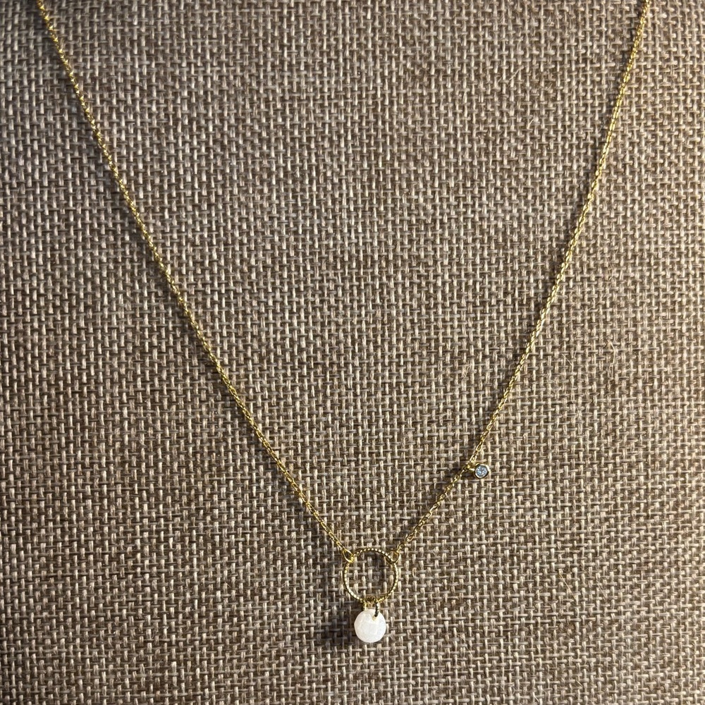 16” adjustable gold plate necklace with moonstone and crystal accents.